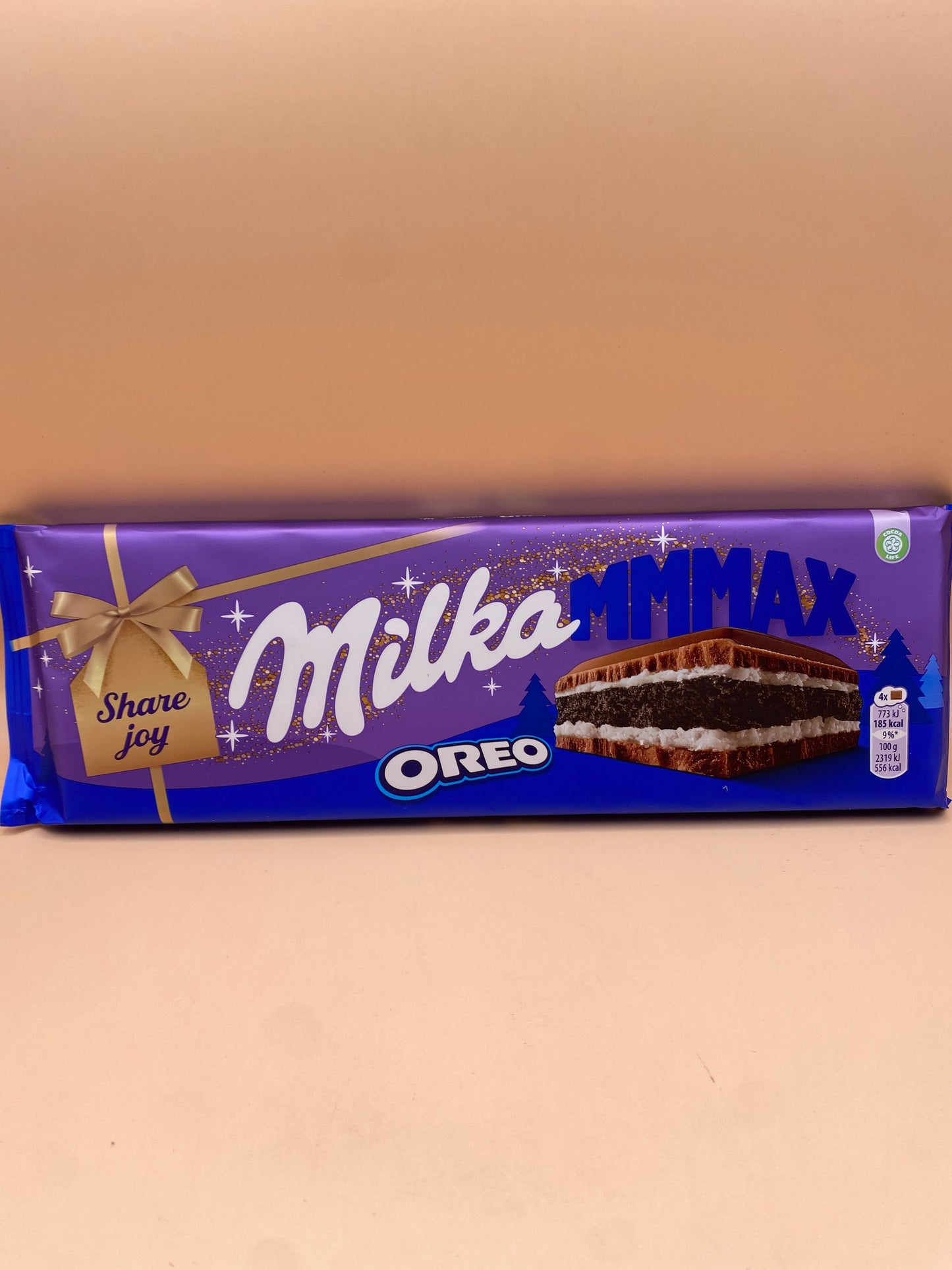 Milka Tejcsokoládé keksz darabokkal 300g
